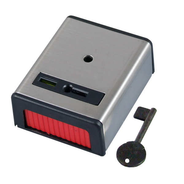 Compact metallic security dongle with a red sliding latch and a separate metal key; used for access or activation of equipment.