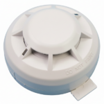 White circular smoke detector device with a raised central button and small tab, molded 'DO NOT PAINT' on the side